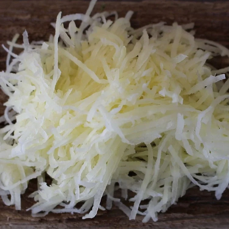 Poteter skrelt raspet 1kg   stk