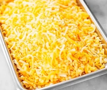 Mozzarella/Cheddar mix 26 % riven